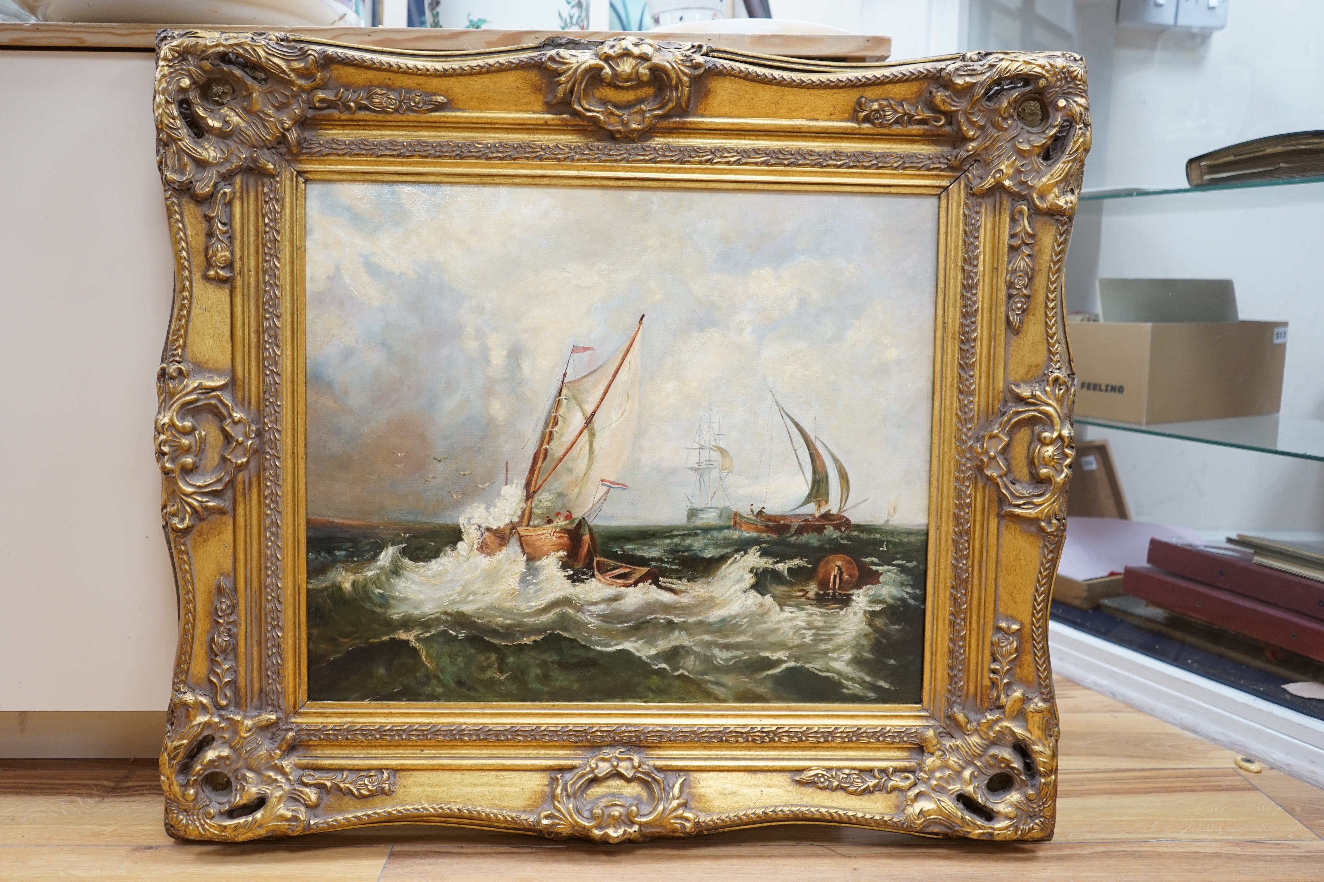 Victorian style, oil on canvas, Ships and rowing boats at sea, indistinct ink inscription verso, 49 x 59cm, ornate gilt frame